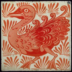 Fliese mit stilisiertem Vogeldesign